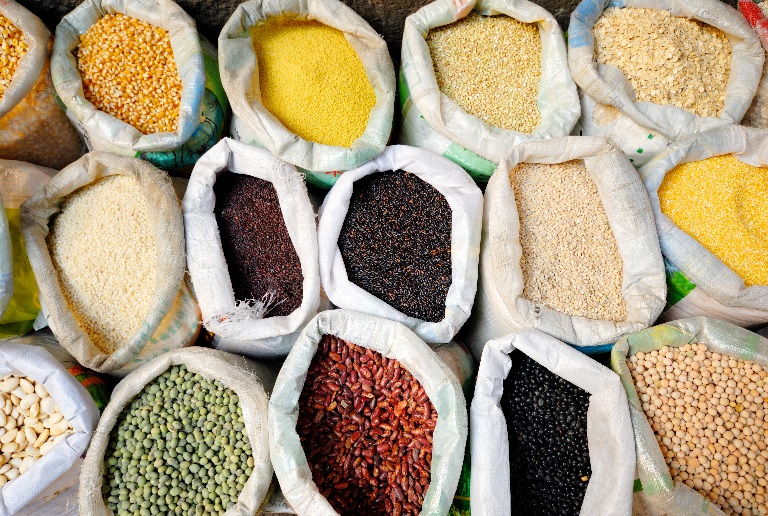 Sacks of healthy legumes and grains.